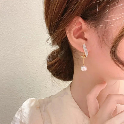 Pearl Wing Stud Korean Earrings